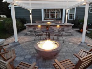 firepit with wood pellets by the pool